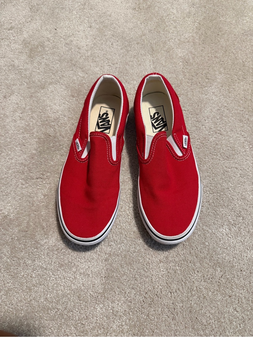 Vans Slip-On Canvas Sneakers in Red and White